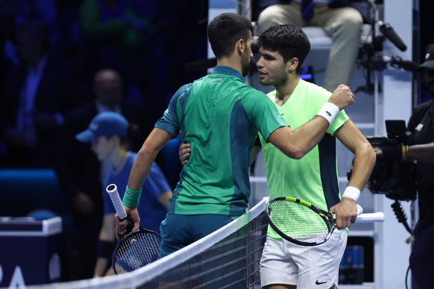 Novak Djokovic vs Carlos Alcaraz Novak Djokovic of Serbia (L) embraces Carlos Alcaraz of Spain (R) at the end of the sem